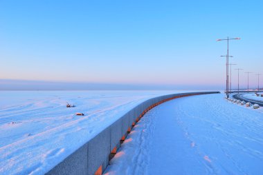 Quay on the shore of the Gulf of Finland in St. Petersburg at dawn