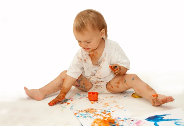 Cute little baby is drawing — Stock Photo, Image