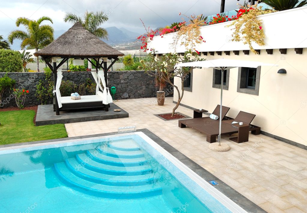 Hut and swimming pool at luxury villa, Tenerife island, Spain