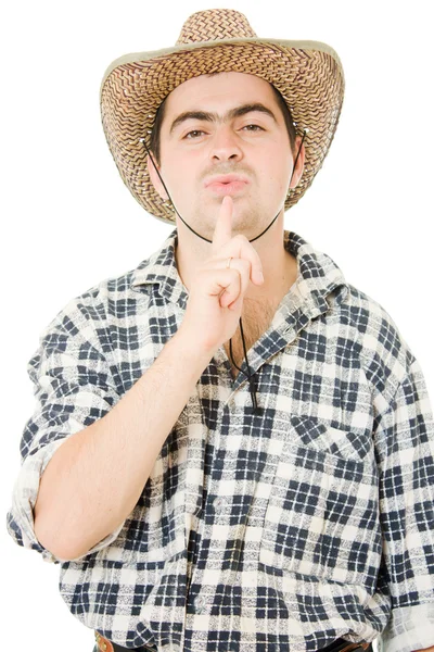 Cowboy blaast aan zijn vinger. — Stockfoto