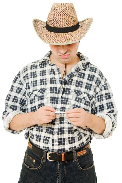 Cowboy with a cigarette in his hand. — Stock Photo, Image