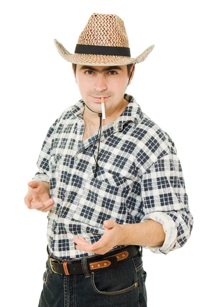 Cowboy med en cigarett i munnen. — Stockfoto