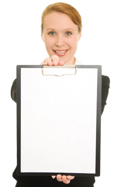 Empresária mostra a página em branco em um fundo branco . — Fotografia de Stock