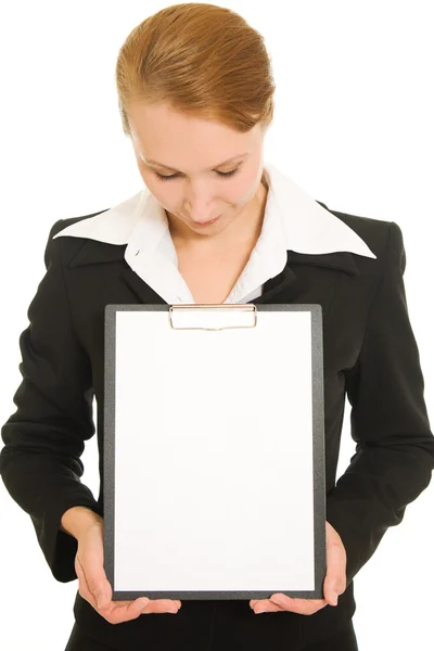 Geschäftsfrau zeigt die leere Seite auf weißem Hintergrund. — Stockfoto