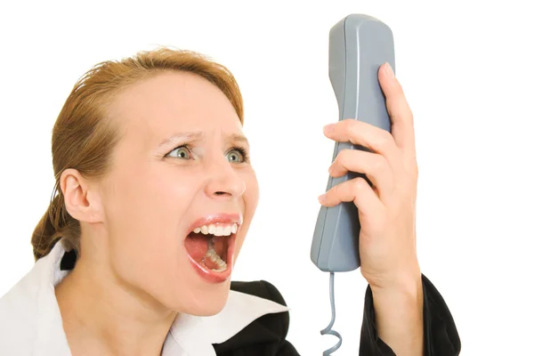 Empresária gritando para o telefone em um fundo branco . — Fotografia de Stock