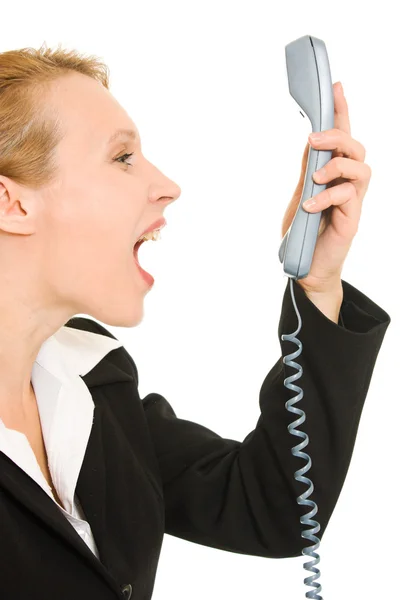 Zakenvrouw schreeuwen in de telefoon op een witte achtergrond. — Stockfoto