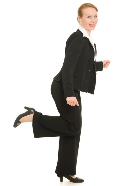 Een zakenvrouw draait op een witte achtergrond. — Stockfoto