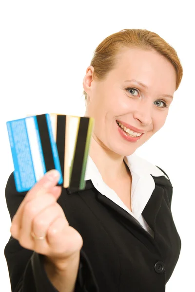 Zakenvrouw met een debit cards op een witte achtergrond. — Stockfoto