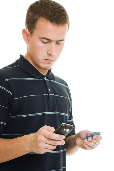 stock image Man with a debit card on a white background.