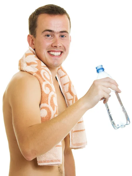 Hombre con toalla de agua potable —  Fotos de Stock
