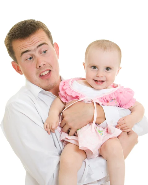 A young father with a baby on a white background. — Stock Photo, Image