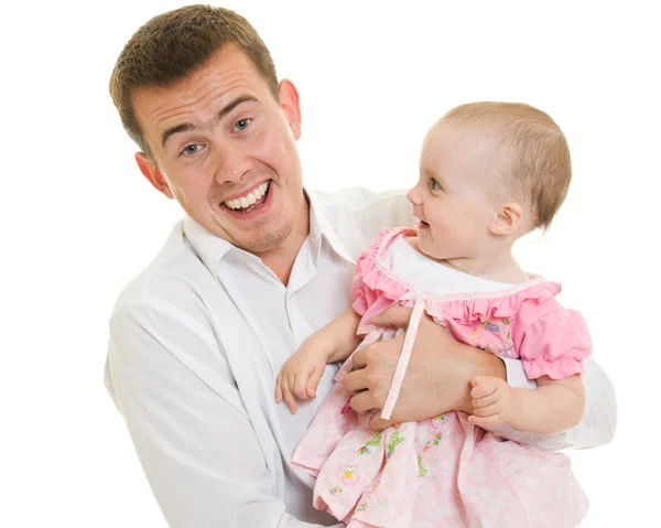 Een jonge vader met een baby op een witte achtergrond. — Stockfoto