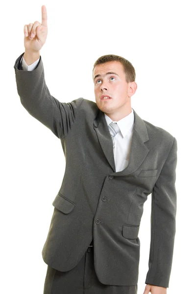 Empresário apontar um dedo sobre um fundo branco . — Fotografia de Stock