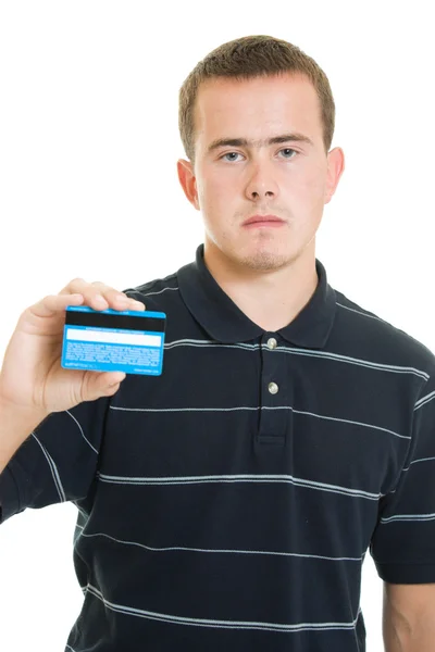 白い背景の上のデビット カードを持つ男. ロイヤリティフリーのストック写真