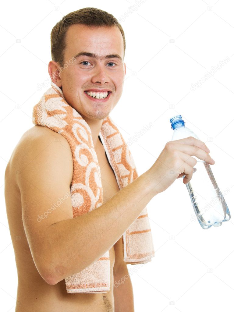 Man with towel drinking water
