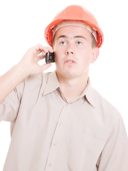 Бизнесмен в шлеме по телефону . — стоковое фото