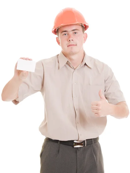 ヘルメットのビジネスマンは彼の手でカードを訪問します。. — ストック写真