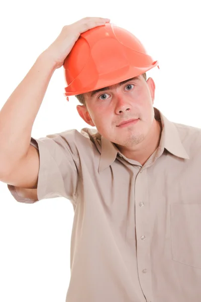Podnikatel s rukama drží na helmu. — Stock fotografie