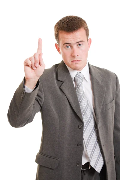 Businessman point a finger on a white background. Royalty Free Stock Photos