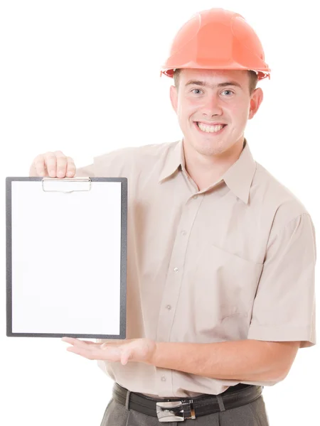 Businessman in helmet holding a tablet. Stock Image
