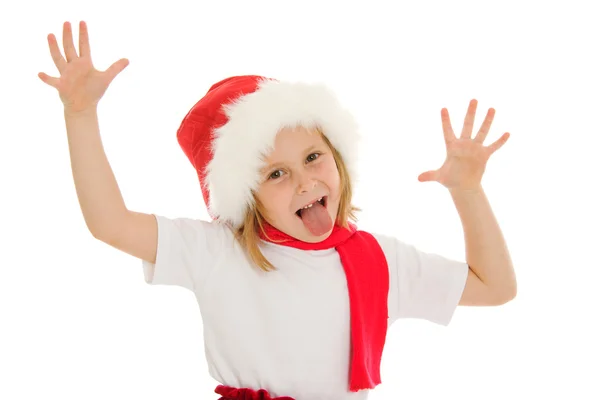Frohes Weihnachtskind posiert mit einem Gesicht auf weißem Hintergrund. — Stockfoto