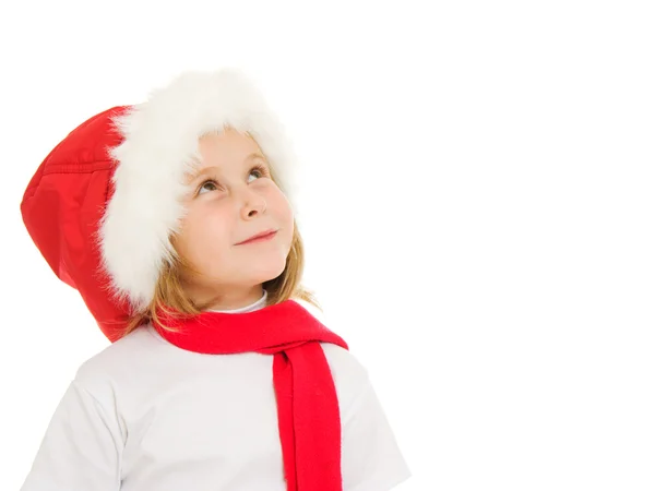 Gelukkig Kerstmis kind opzoeken op een witte achtergrond. — Stockfoto