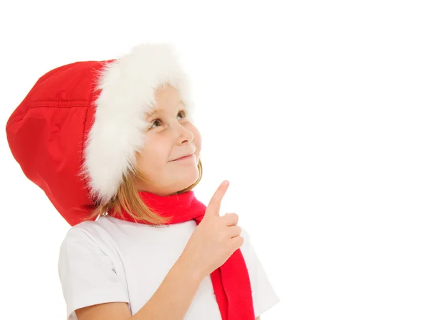 Счастливый рождественский ребенок показывает пальцем вверх на белом фоне — стоковое фото
