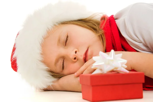 Kerstmis kind is slapen op de vloer. — Stockfoto
