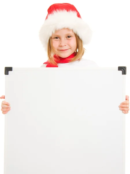 Criança de Natal feliz com o conselho em um fundo branco . — Fotografia de Stock