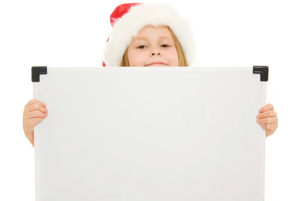 Frohes Weihnachtskind mit dem Brett auf weißem Hintergrund. — Stockfoto