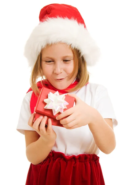Happy Christmas child with a box on a white background. Stock Photo