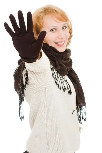 Eine Frau zeigt einen Handstopp auf weißem Hintergrund. — Stockfoto