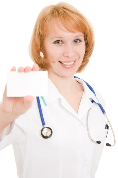 Médico segurando cartão em branco no fundo branco . — Fotografia de Stock
