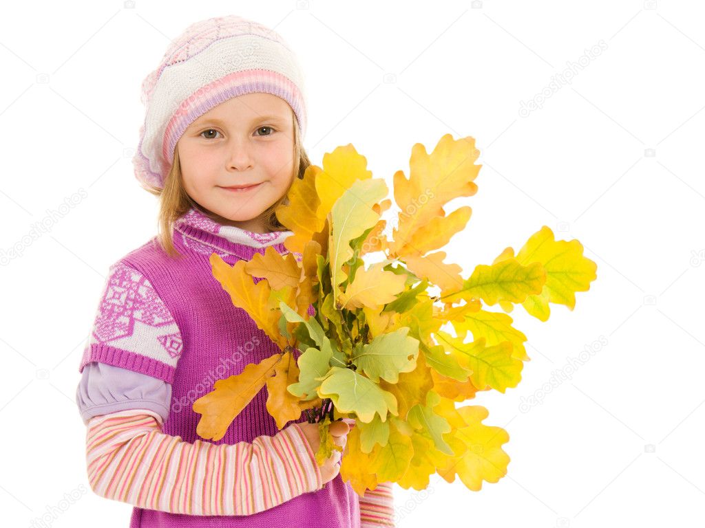 Girl with a bouquet of oak leaves on a white background.
