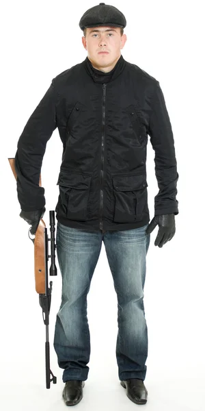 Men with a gun on a white background. — Stock Photo, Image