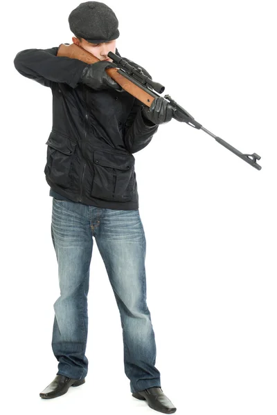 Män med en pistol på en vit bakgrund. — Stockfoto