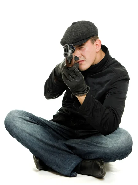Hombres con un arma sobre un fondo blanco . — Foto de Stock