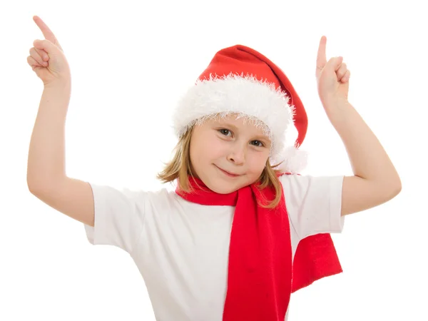 Happy Christmas child points his finger upward on a white background — Stock Photo, Image