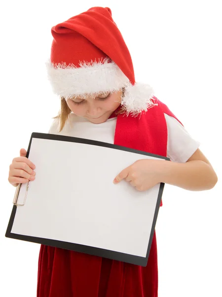 Happy Christmas child points his finger at the white board. — Stock Photo, Image
