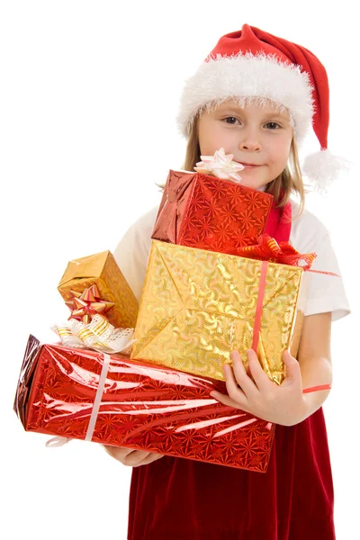 Joyeux Noël enfant avec des cadeaux dans les boîtes sur un fond blanc . — Photo