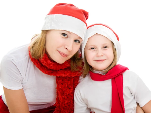 С Рождеством мать и дочь на белом фоне . — стоковое фото