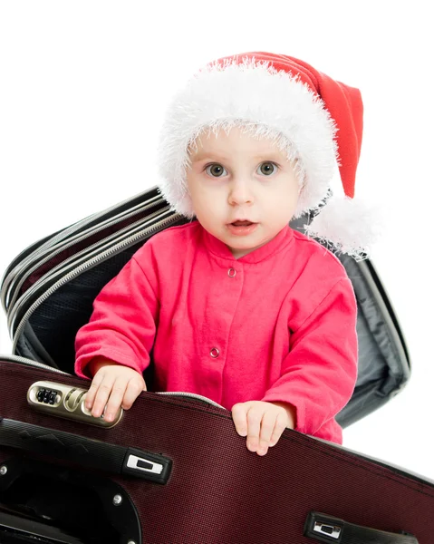 Noel bebeği bavul beyaz zemin üzerine. — Stok fotoğraf