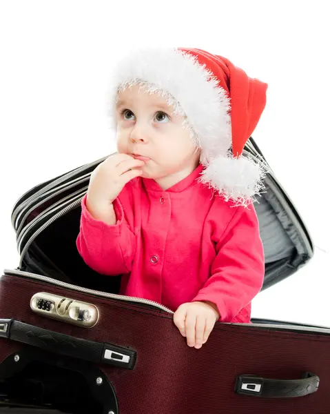 Natal bebê na mala em um fundo branco . — Fotografia de Stock