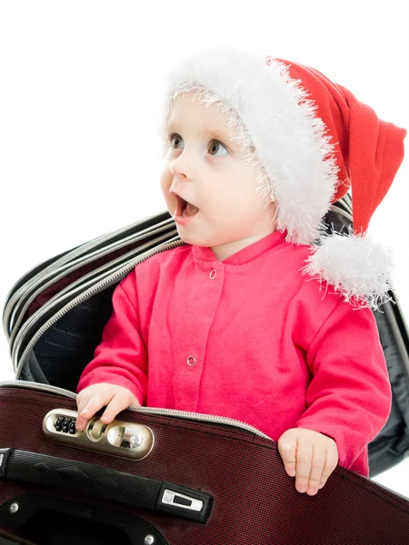 在白色背景上的手提箱里的圣诞宝宝. — 图库照片