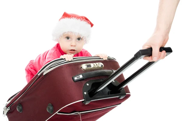 Vánoční baby v kufru na bílém pozadí. — Stock fotografie