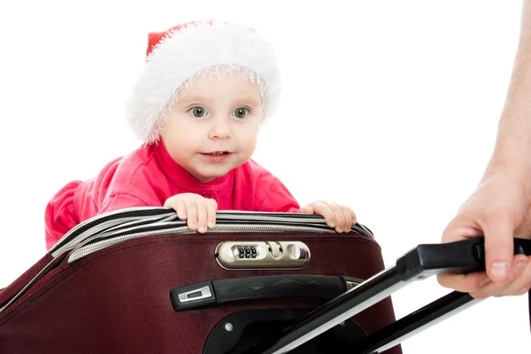 Karácsonyi baba fehér háttérben bőröndöt. — Stock Fotó