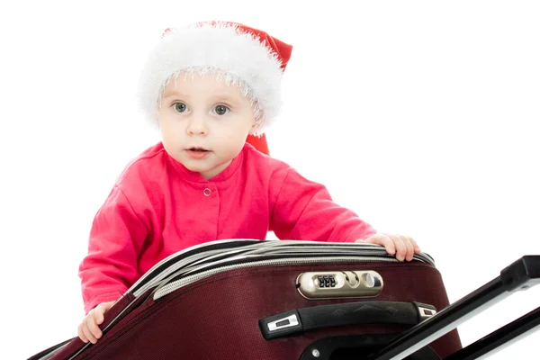 Natal bebê na mala em um fundo branco . — Fotografia de Stock