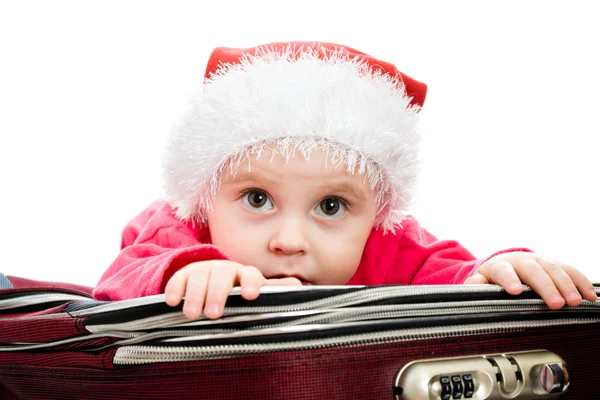 Bébé de Noël dans la valise sur fond blanc . — Photo