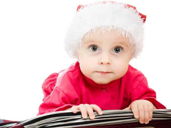 Bébé de Noël dans la valise sur fond blanc . — Photo