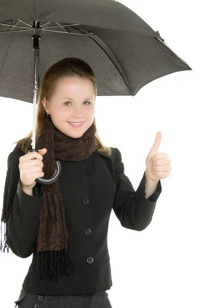La donna è bene sotto un ombrello su uno sfondo bianco . — Foto Stock